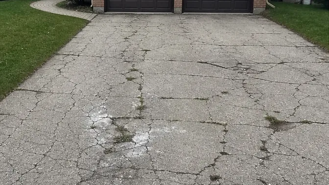 Concrete Driveway Removal in Richmond Hill before work began