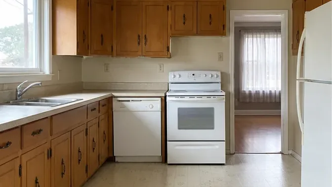 Dated kitchen before a selective interior demolition